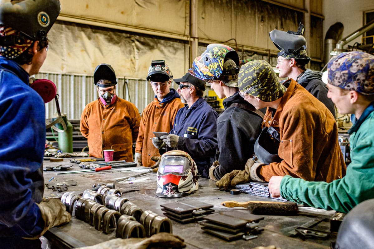 Steve Boprda, welding instructor, with group of students at Ready Arc Training